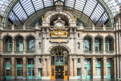 Antwerp city guide.Central Station.01 Majestic wall with clock of Central Station of Antwerp