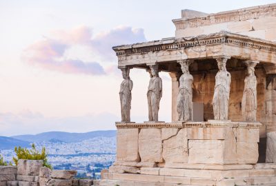 Athens city guide.Erechtheion Acropolis.01 Erechtheion on the Acropolis and view over the city