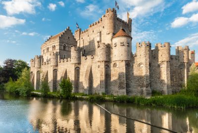 Ghent city guide.Gravensteen.02 Gravensteen castle in Ghent with its reflection in the water