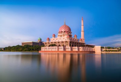 Kuala Lumpur city guide.Putra Mosque.01 Putra Mosque in Kuala Lumpur reflected in the water