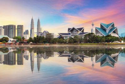 Kuala Lumpur city guide.Titiwangsa Park View from the opposite shore of the lake to the pavilions of Titiwangsa Park and the skyscrapers of Kuala Lumpur