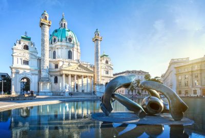 Vienna city guide.Karlskirche Vienna.01 Vienna's Karlskirche baroque church in the sun