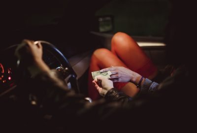 Munich street prostitutes.01 Munich street hooker handed over cash in car