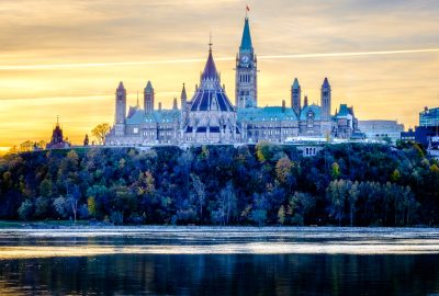 Ottawa city guide.Canadian Parliament.01 The buildings of the Canadian Parliament on Parliament Hill in Ottawa at sunset
