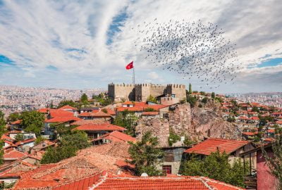 Ankara city guide.Ankara Castle.01 Ankara Castle beneath a flock of birds and panorama view of Ankara