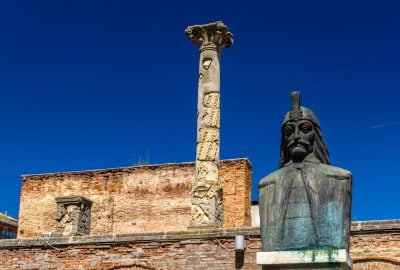 Bucharest city guide.Curtea Veche.02 Curtea Veche (the Old Princely Court) with the bust of Vlad Tepes in centre of Bucharest