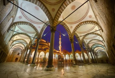 Istanbul city guide.Blue Mosque.02 Inner court of the Blue Mosque beautifully illuminated by night