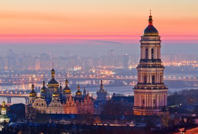 Kiev city guide.Kiev Pechersk Lavra.02 The monstarey complex of Kiev Pechersk Lavra and panorama of the right bank of the Dniepr river during sunset