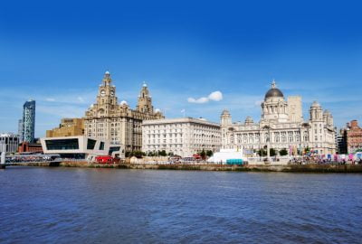 Liverpool city guide.waterfront at river Mersey with the Three Graces.01 The Three Graces, Liverpool's eye catching historical buildings at the waterfront of the river Mersey in Liverpool