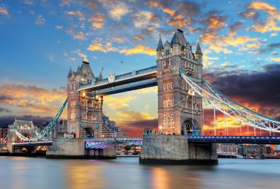 London city guide.Tower Bridge.01 Tower Bridge in London overspanning the Thames during sunset