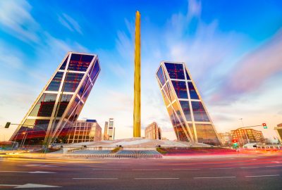 Madrid city guide.Plaza Castilla.02 Plaza de Castilla with the twin towers Torres KIO and the golden obelisk Obelisco de Caja Madrid