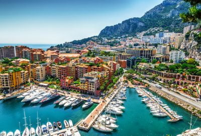 Monaco city guide.Port Hercules Monte Carlo.01 View of Monte Carlo and luxury yachts in Port Hercules in La Condamine quarter of Monaco