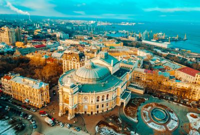 Odessa city guide.National Academic Opera and Ballet Theater.01 Bird's eye view of the Odessa National Academic Theatre of Opera and Ballet with Black Sea at the background