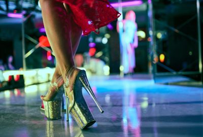 Pole dancers and strippers on stage in Sochi striptease club