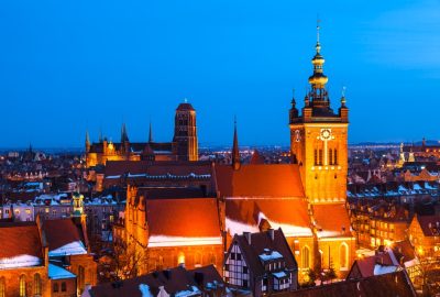 Gdansk-city-guide.St_.-Catherines-Church-and-St.-Marys-Basilica.02.jpg Winter evening view at St. Catherine's Church and St. Mary`s Basilica in Gdansk