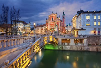 Ljubljana city guide.Tripple Bridge and Franciscan Church.01 Tripple Bridge and Franciscan Church in Ljubljana at night