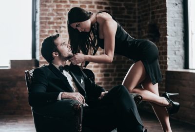 Sexy brunette seducing man in Montreal swinger club