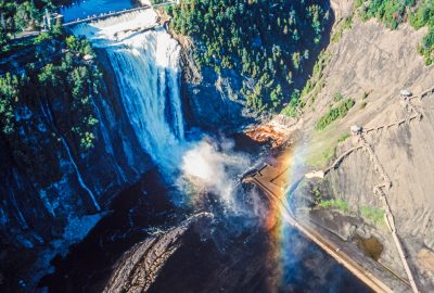 Quebec City city guide.Montmorency Falls.02 The Montmorency Falls dropping over the cliff shore into the Saint Lawrence River near Quebec City